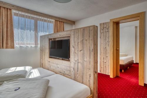 Postel nebo postele na pokoji v ubytování Hotel Jägerhof