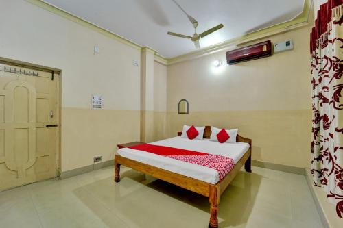 Postel nebo postele na pokoji v ubytování Super Hotel O SHER ऐ PUNJAB
