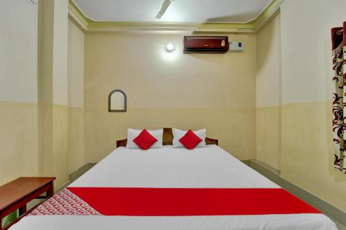 Ένα ή περισσότερα κρεβάτια σε δωμάτιο στο Super Hotel O SHER ऐ PUNJAB