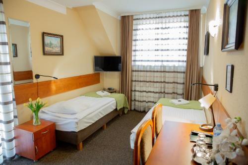 Llit o llits en una habitació de Motel Arkadia