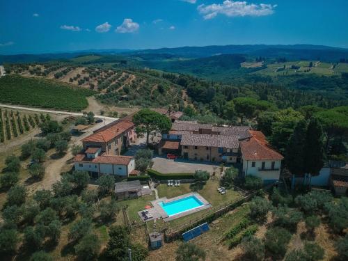 an aerial view of a estate with a swimming pool at Fattoria Le Fonti in Poggibonsi