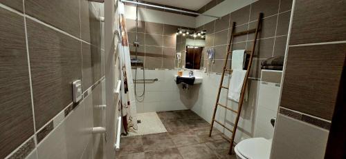 Kuchyň nebo kuchyňský kout v ubytování Hotel La Reserve
