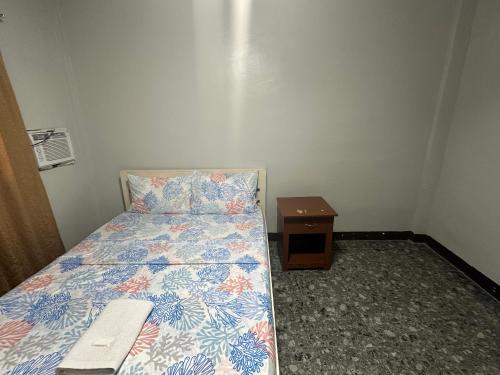 Ένα ή περισσότερα κρεβάτια σε δωμάτιο στο Ohana Rooms
