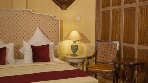 Postel nebo postele na pokoji v ubytování Kayu Arum Resort