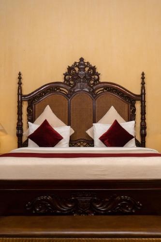 Postel nebo postele na pokoji v ubytování Kayu Arum Resort