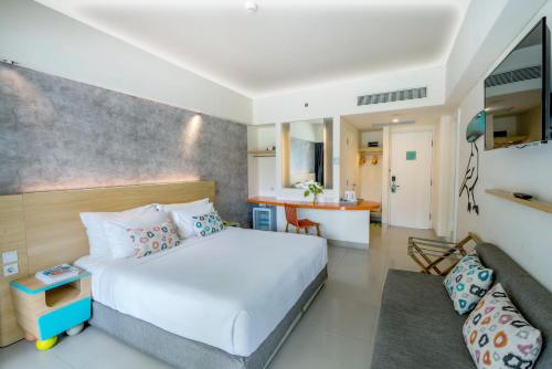 Katil atau katil-katil dalam bilik di Tijili Hotel Benoa