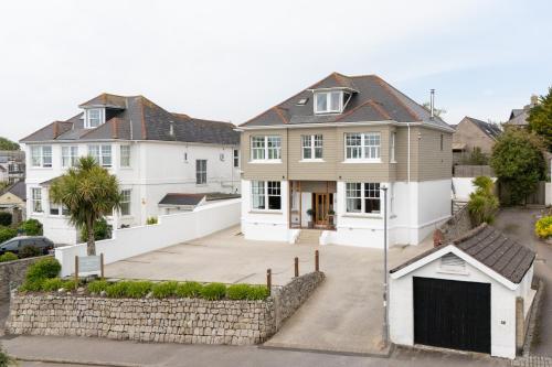 an aerial view of a house with a driveway at Falmouth Bay in Falmouth