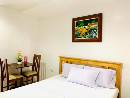 Postel nebo postele na pokoji v ubytování The Seaside Residences