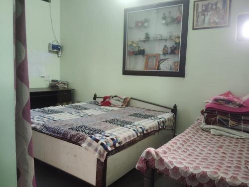 Katil atau katil-katil dalam bilik di Gaurav Homestay