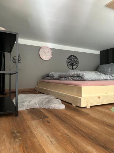 Una cama o camas en una habitación de MH Home