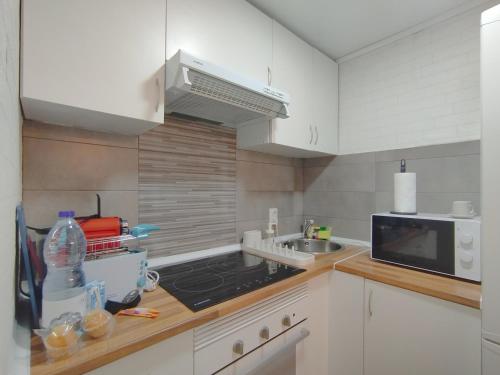 Kuchyň nebo kuchyňský kout v ubytování Apartamento Acogedor Oviedo Centro