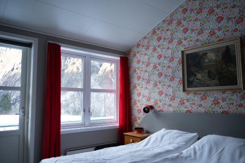 Postel nebo postele na pokoji v ubytování Akrafjorden Nature B&B AS