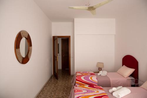 Postel nebo postele na pokoji v ubytování B&B Amore di Puglia