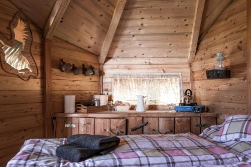 Postelja oz. postelje v sobi nastanitve Treehouse Šumava