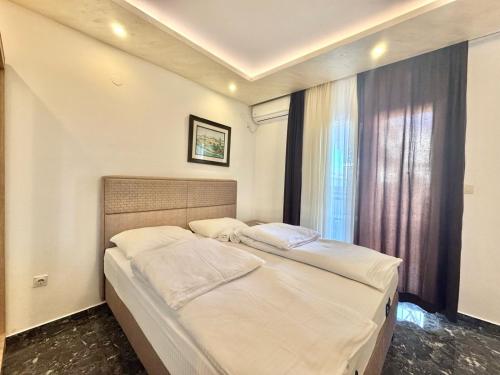 Ένα ή περισσότερα κρεβάτια σε δωμάτιο στο Beachfront Hotel Palma - Jaz