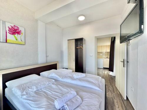 Ένα ή περισσότερα κρεβάτια σε δωμάτιο στο Beachfront Hotel Palma - Jaz