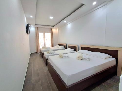Ένα ή περισσότερα κρεβάτια σε δωμάτιο στο Beachfront Hotel Palma - Jaz