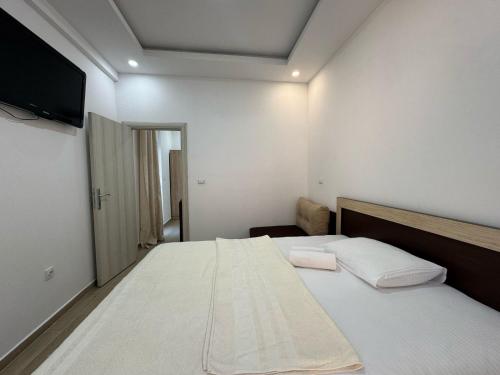 Ένα ή περισσότερα κρεβάτια σε δωμάτιο στο Beachfront Hotel Palma - Jaz
