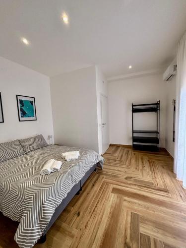 Ένα ή περισσότερα κρεβάτια σε δωμάτιο στο Guest House Levante