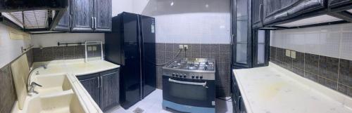 Kuchyň nebo kuchyňský kout v ubytování شقة