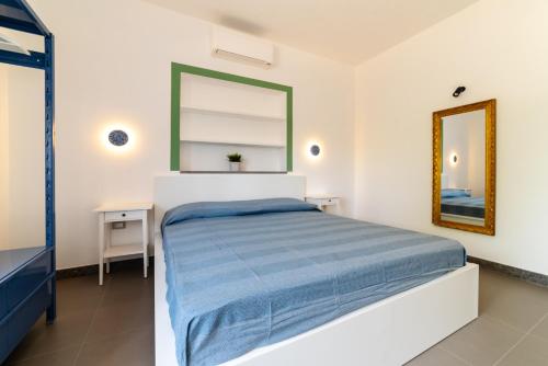 Ένα ή περισσότερα κρεβάτια σε δωμάτιο στο Casa Il Paino
