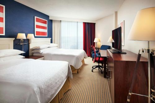 Un ou plusieurs lits dans un hébergement de l'établissement Sheraton San Diego Resort