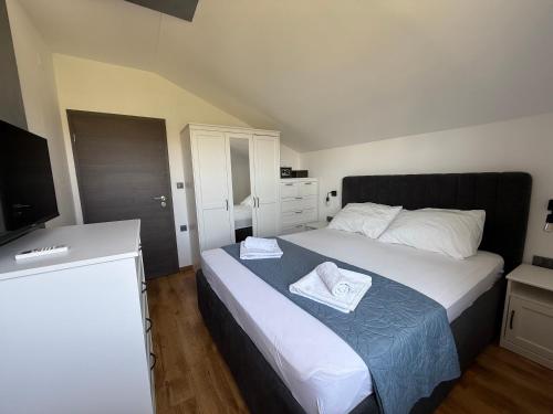 Postel nebo postele na pokoji v ubytování Apartment Zidaric