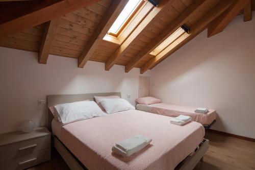 Postel nebo postele na pokoji v ubytování House x visit 5TerreTigulliobay