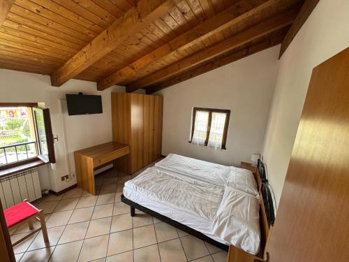 Postel nebo postele na pokoji v ubytování Hotel e Ristorante Cassone