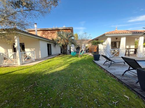 Photo de la galerie de l'établissement Villa familiale aux portes de la Dune du Pilat, à Gujan-Mestras