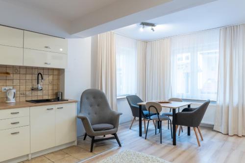 Posezení v ubytování Willa Bliźniak - Pokoje i Apartamenty Bardzo Blisko Plaży