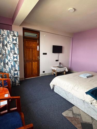 TV a/nebo společenská místnost v ubytování The Silver Spring Homestay