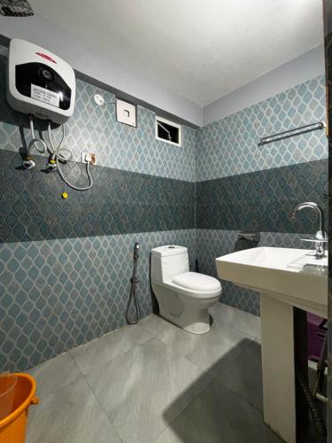 Koupelna v ubytování The Silver Spring Homestay
