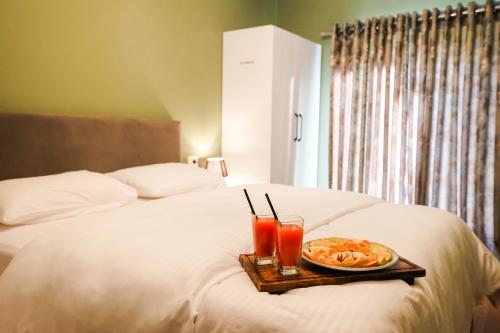 Uma cama ou camas num quarto em Agroturizëm Via Egnatia