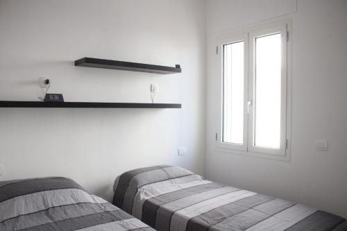 Postel nebo postele na pokoji v ubytování Casa Mondes