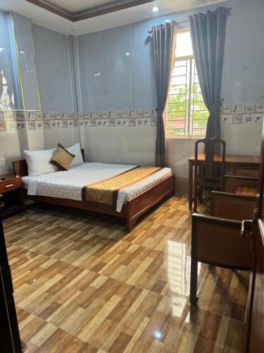 Postel nebo postele na pokoji v ubytování Sơn Tùng Motel