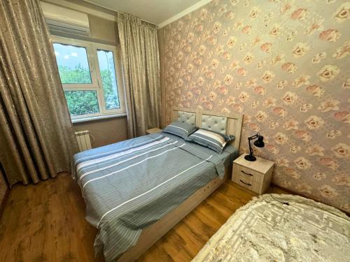 Ένα ή περισσότερα κρεβάτια σε δωμάτιο στο Large Appartment & Central Place