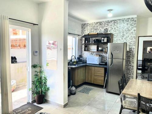 Køkken eller tekøkken på Casa de Praia do Dema com Piscina prox Praia