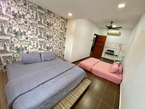 Ένα ή περισσότερα κρεβάτια σε δωμάτιο στο Southkey Mid Valley & KSL 超大双层别墅 可容纳20人 适合家庭聚会