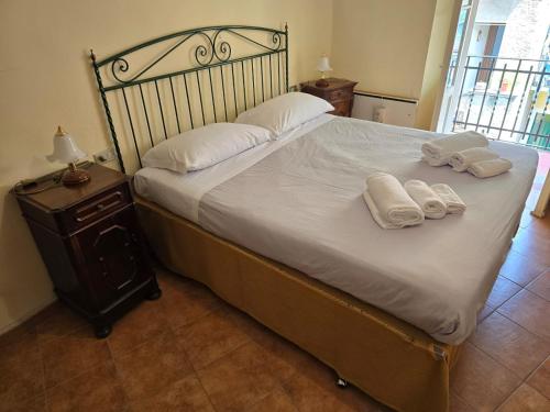 Ένα ή περισσότερα κρεβάτια σε δωμάτιο στο Antica Rocca Riva Bianca