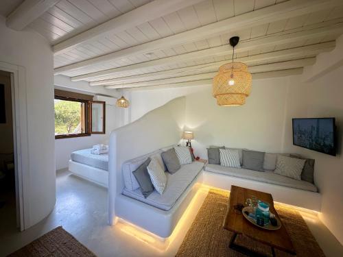 a living room with a couch and a table at Divers House in Agrari