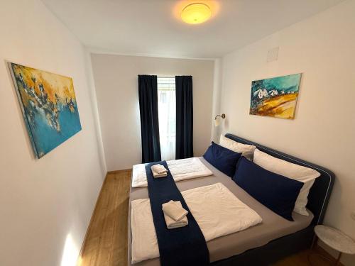 Postel nebo postele na pokoji v ubytování Gästeapartments Rossatz