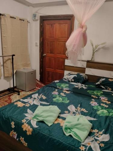Ένα ή περισσότερα κρεβάτια σε δωμάτιο στο ภูมิคิมมินทร์ รีสอร์ท & สปา