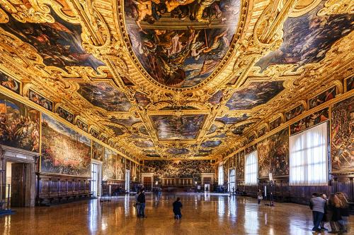 a large room with paintings on the ceilings of a building at Caorle Oasis Beach House - Host Solution in Caorle