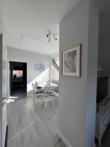Ferienwohnung Inselliebeにあるテレビまたはエンターテインメントセンター