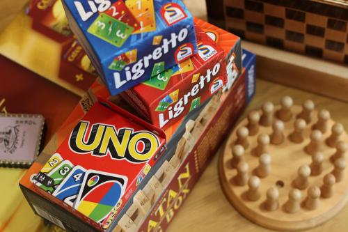 two stacks of snacks on a table next to a cookie at Cabana Luminis in Râşnov