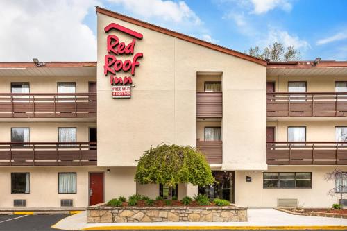 a hotel exterior with a red roof inn at Red Roof Inn Tinton Falls-Jersey Shore in Tinton Falls
