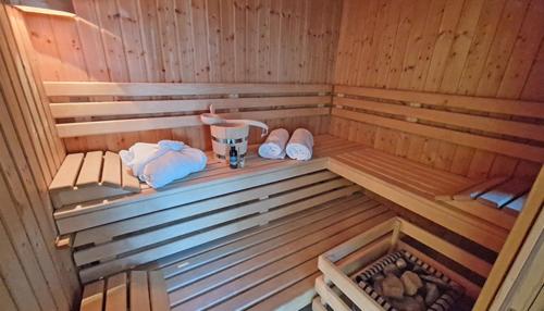 an inside of a sauna with shoes and a blender at Johanna BRINKMANNHAUS -historisch viel Platz fast am Strand Sauna Terrasse Grill in Bansin