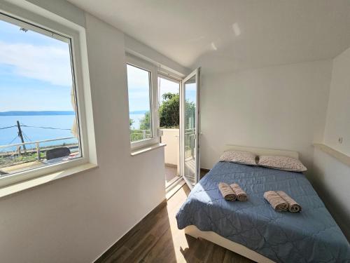 Posteľ alebo postele v izbe v ubytovaní Apartments Majic Zivogosce