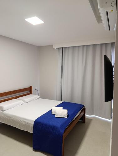 Katil atau katil-katil dalam bilik di Comfort and leisure at 600 MT of Flamengo beach!